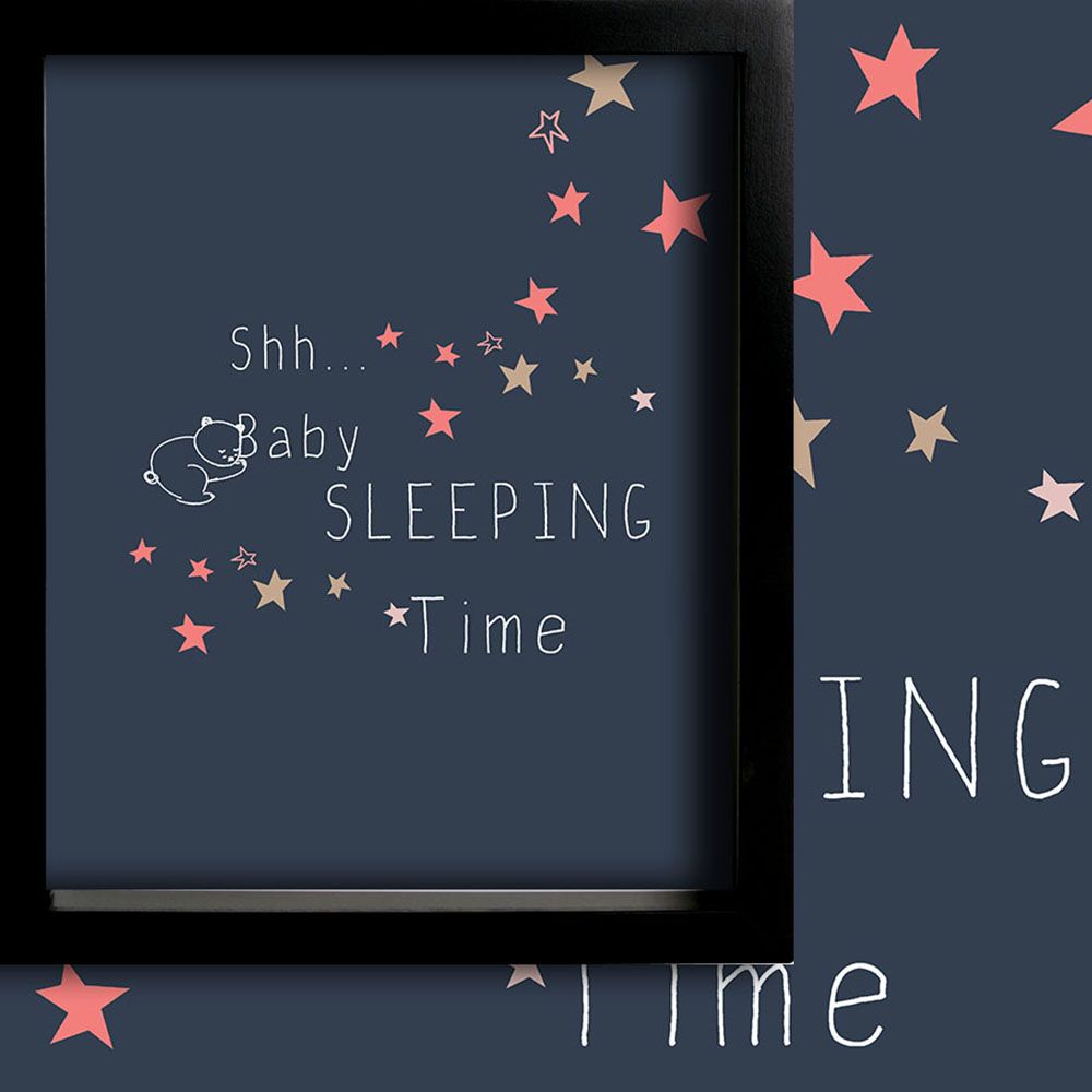Nursery room with a dark blue curtain displaying a sleeping baby illustration and stars, paired with a framed ‘Be Happy My Baby’ print and wooden crib for a soft, cosy baby room aesthetic.