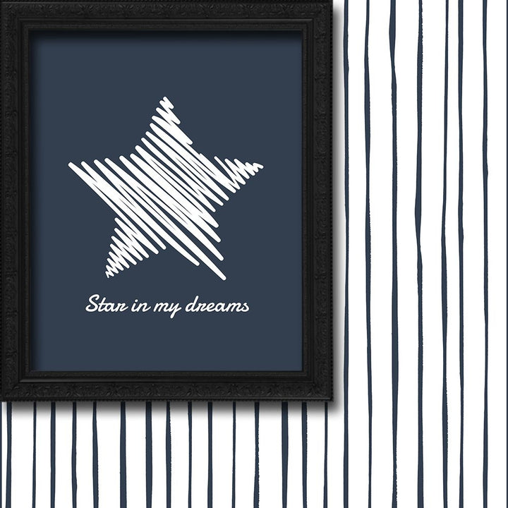 Framed artwork with a white star and 'Star in my dreams' text on a navy background