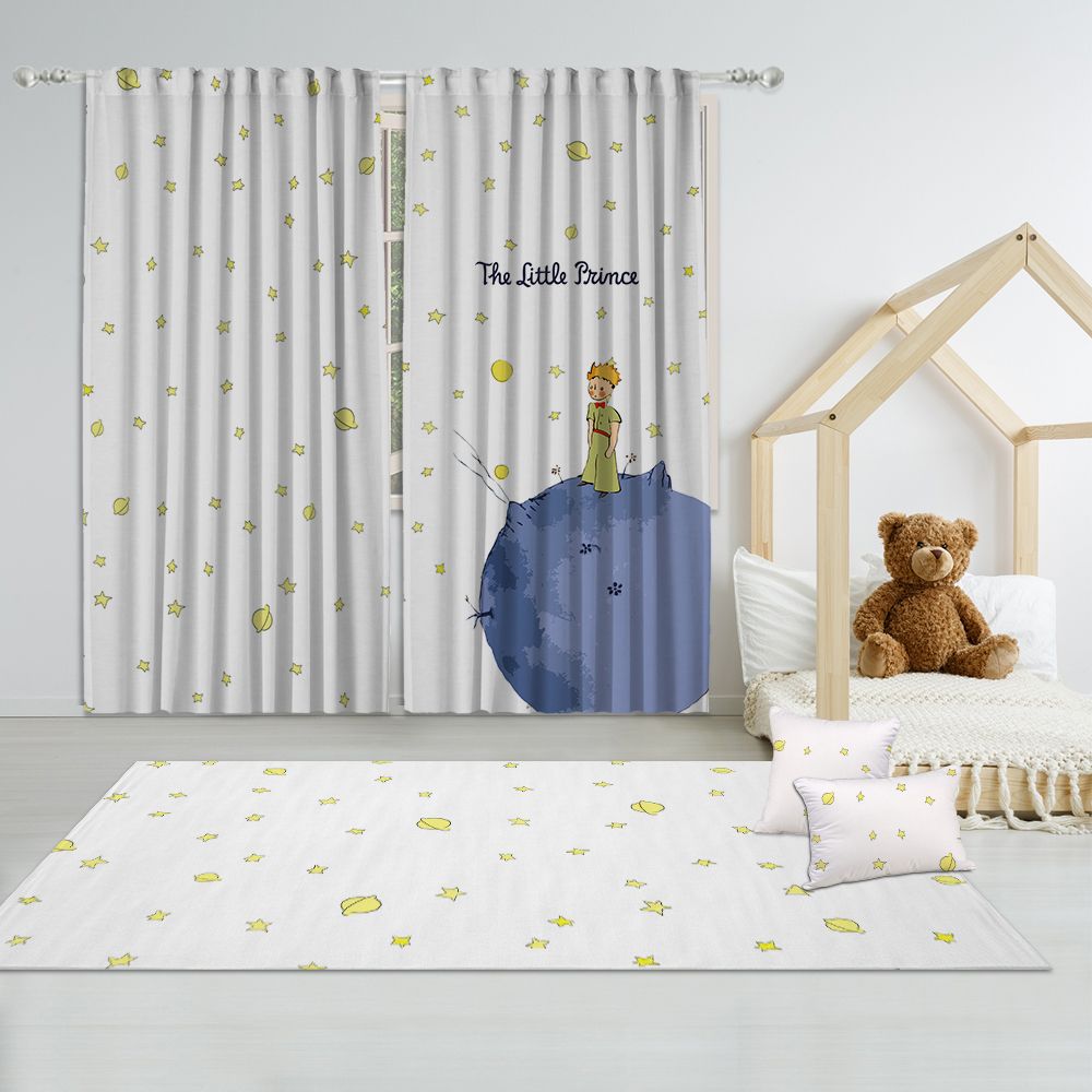 Kids's room with 'The Little Prince' themed curtain, rug, and teddy bear.