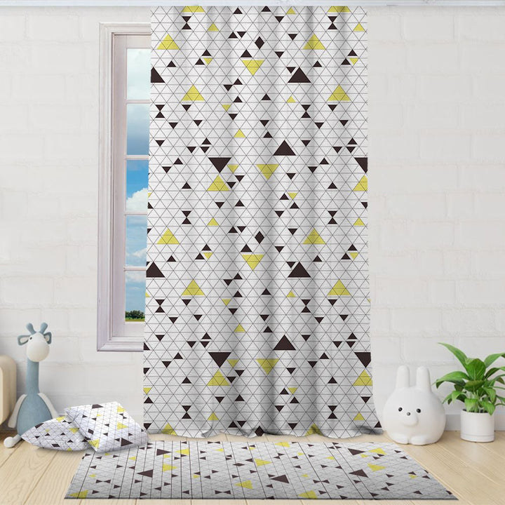 Kids Room with a geometric patterned curtain and rug, featuring a window and decorative items.