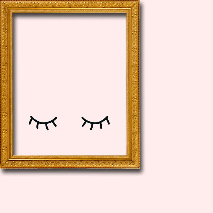 black eyelash design on a pink background