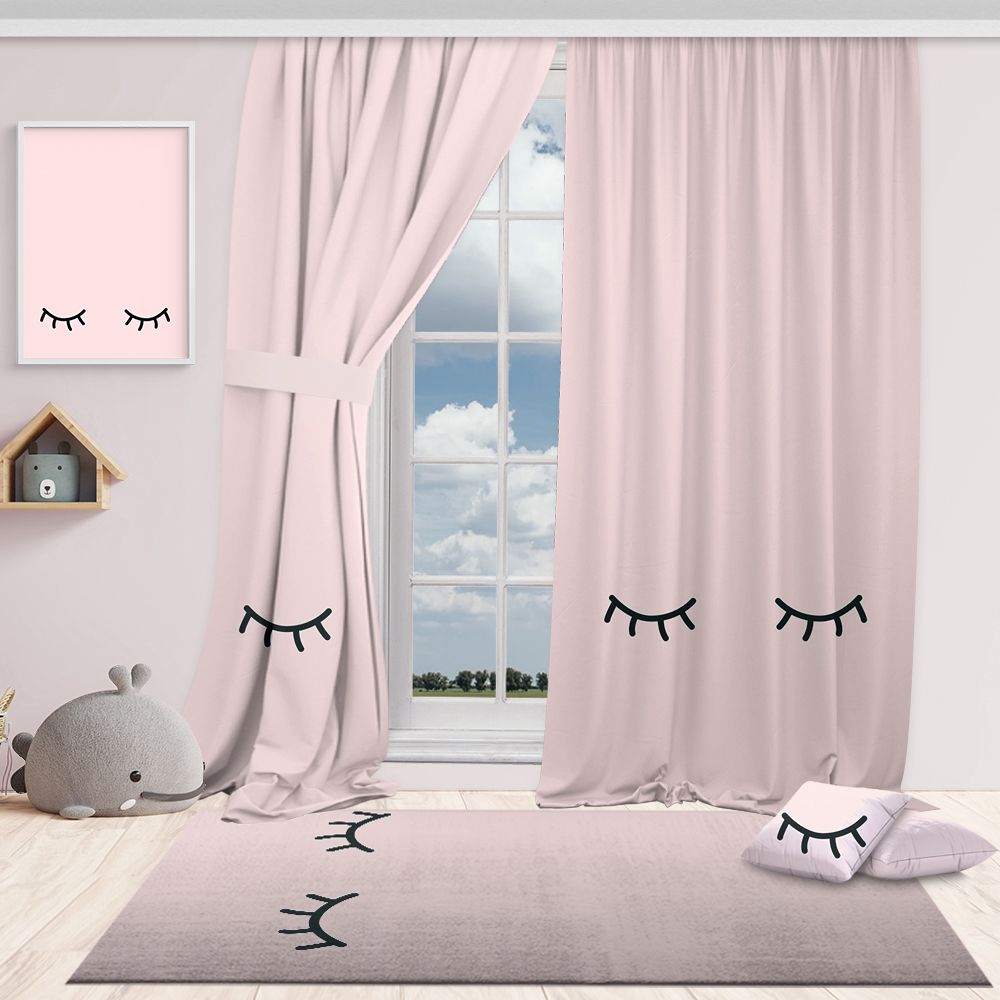 Pink curtains with eye-shaped decorations in a room with a window, rug, and decorative items.