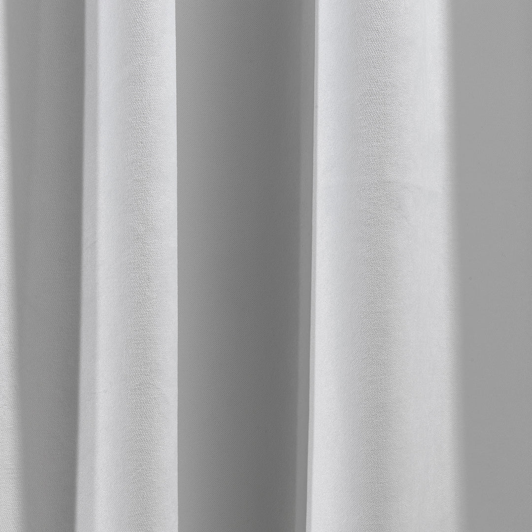 A soft matte velvet fabric swatch in white, showing smooth pile texture and clean matte finish, made to measure and available by the metre.