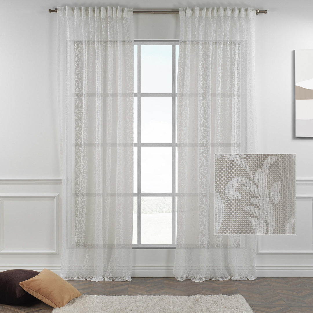 A made to measure white sheer voile curtain displayed in an extra‑wide panel with a clean airy look and natural soft light diffusion