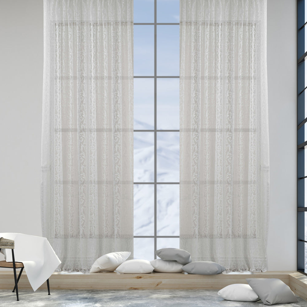 A white sheer voile curtain in extra‑wide width, made to measure with a soft translucent finish and elegant flowing drape