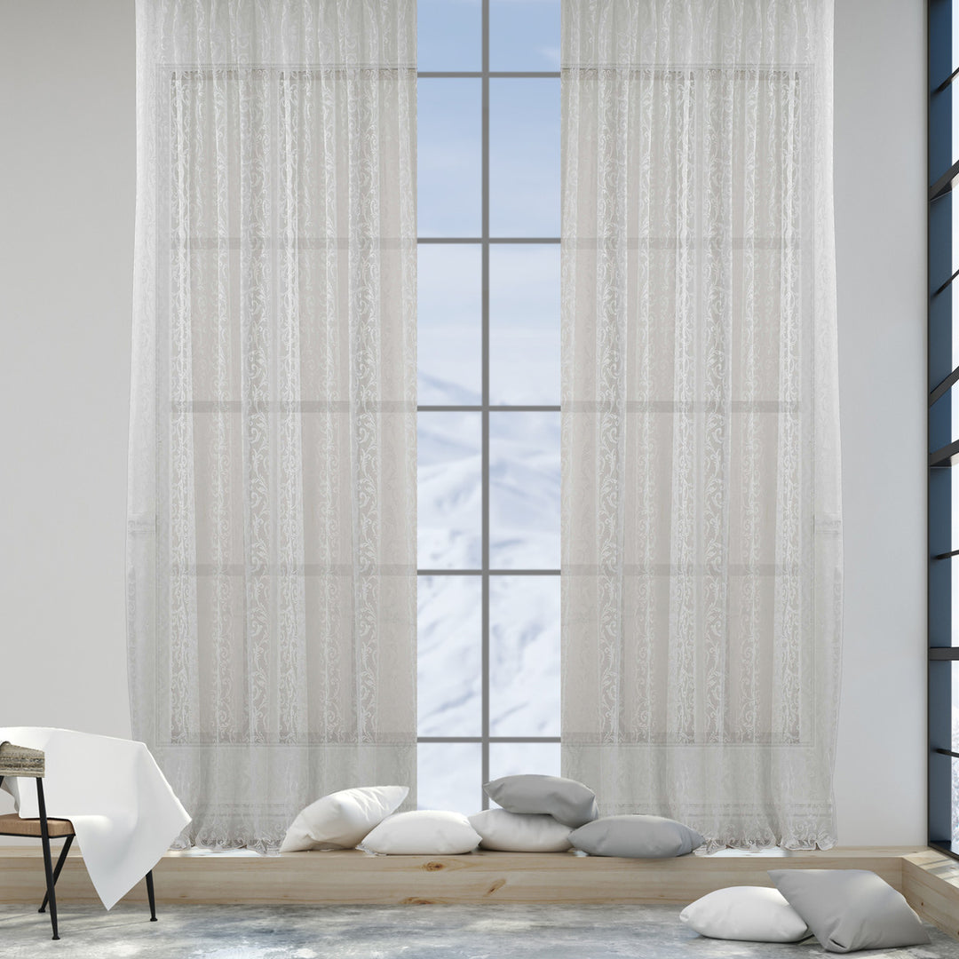 A white sheer voile curtain in extra‑wide width, made to measure with a soft translucent finish and elegant flowing drape