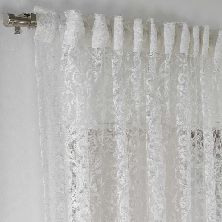  A white sheer voile curtain with a rod‑pocket header, made to measure and shown with a light airy drape and smooth woven texture