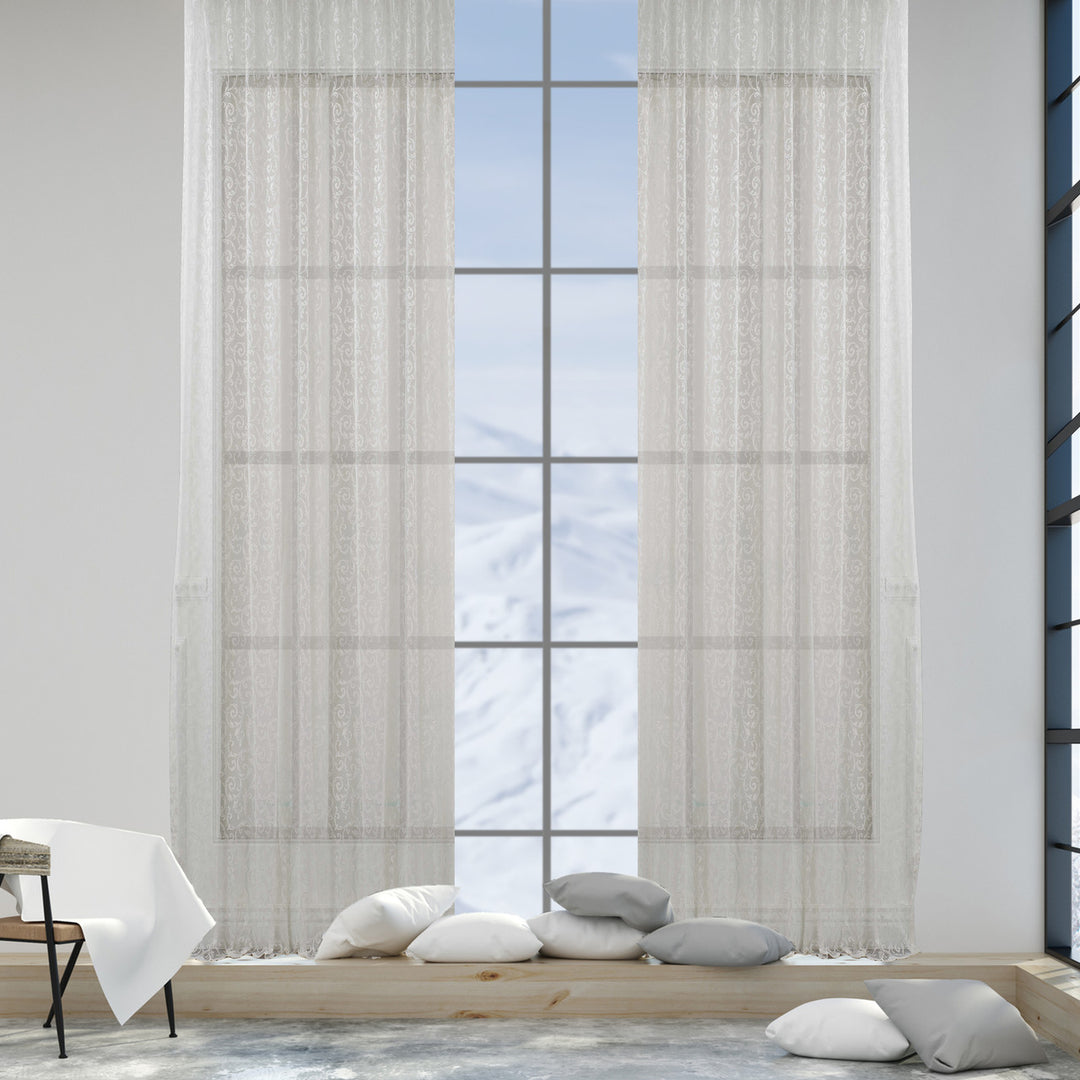 An off‑white ivory voile curtain in extra‑wide width, made to measure with a soft sheer texture and clean flowing drape