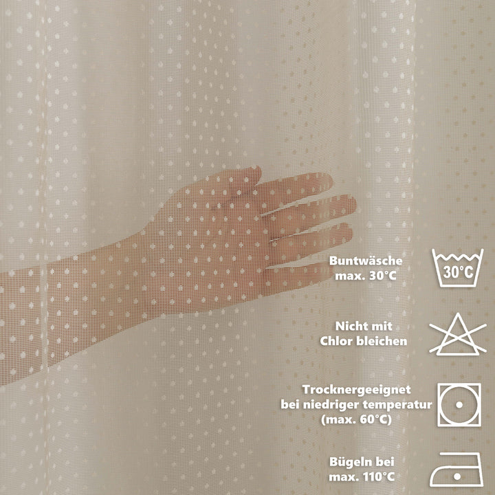 Hand touching a textured fabric with care instructions displayed on the right.