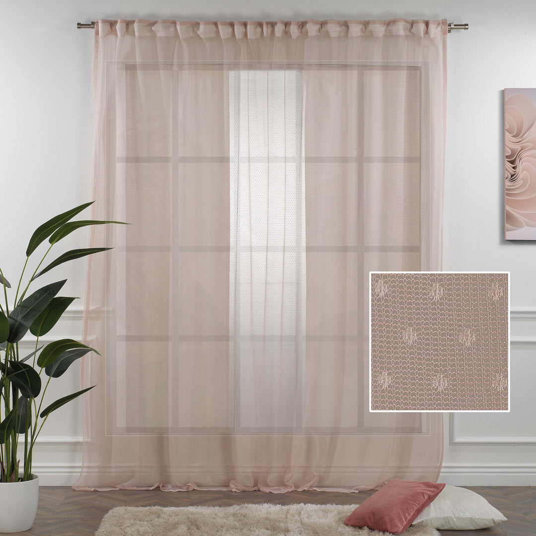 A close detail of pink polka‑dot sheer voile fabric with a lightweight airy texture and soft flowing translucency