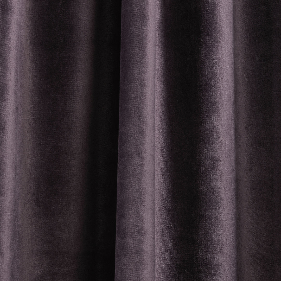 A soft matte velvet swatch in dark byzantium, highlighting deep purple tone, smooth pile and matte finish, made to measure and available by the metre.