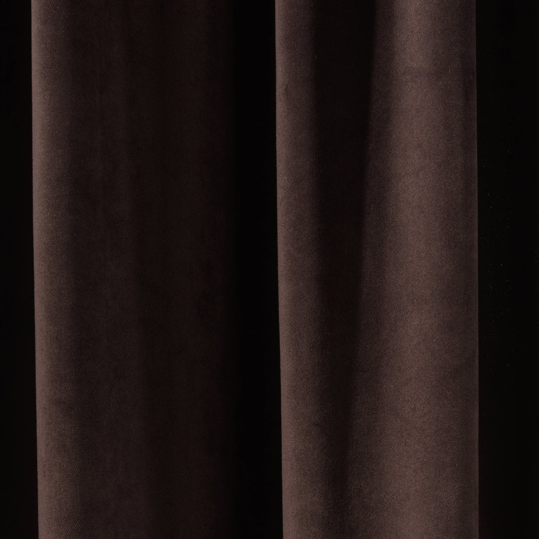 A soft matte velvet swatch in dark brown, showing rich warm tone, smooth pile texture and matte surface, made to measure and available by the metre.