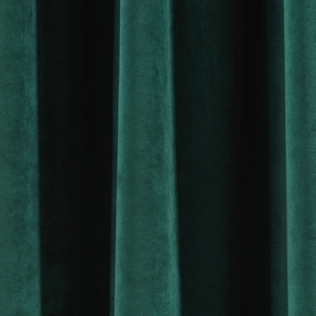 A soft matte velvet swatch in deep jungle green, highlighting rich forest tone, smooth pile and matte finish, made to measure and available by the metre.