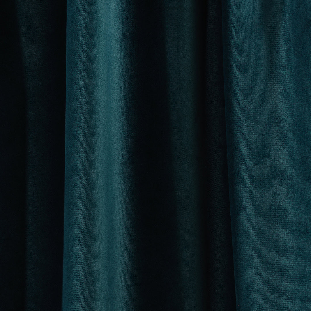 A soft matte velvet swatch in midnight green, showing deep cool tone, fine pile and matte surface, made to measure and available by the metre.