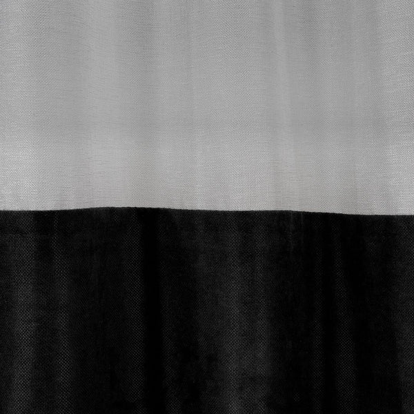 A styled two tone velour block curtain theme image showing smooth pile texture, elegant drape and coordinated interior presentation.