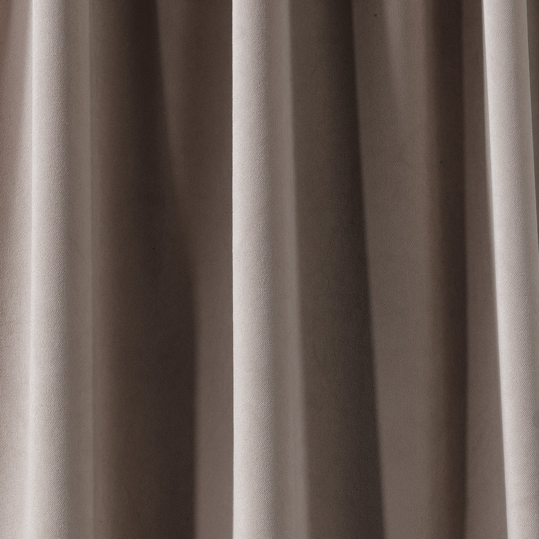 A soft matte velvet fabric swatch in tan, highlighting warm neutral tone, smooth pile and matte finish, made to measure and available by the metre.