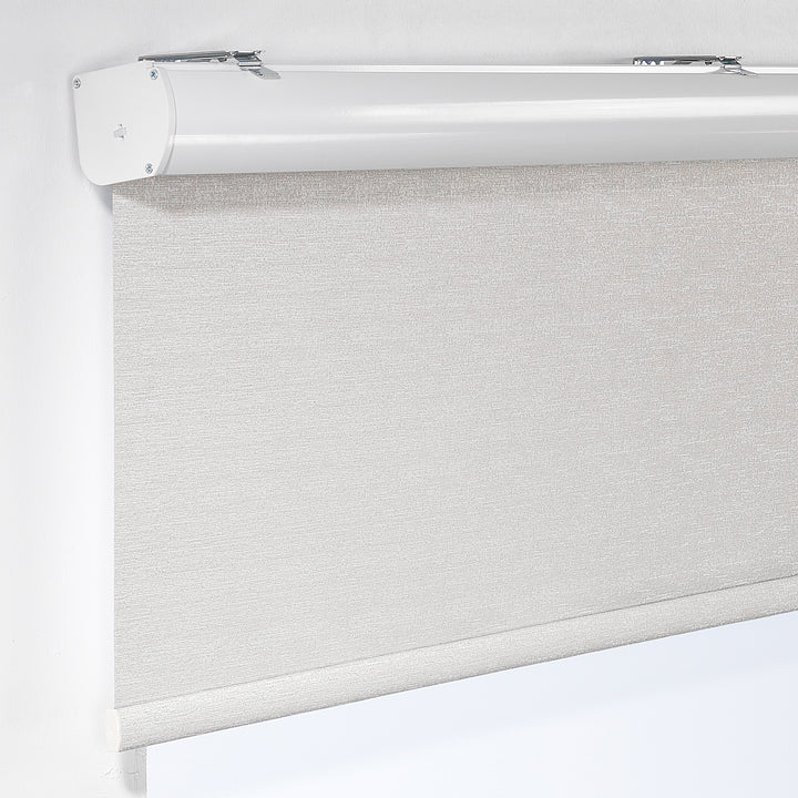 A made to measure beige marble‑textured room darkening roller blind displayed with a natural stone‑look pattern and tidy straight lines