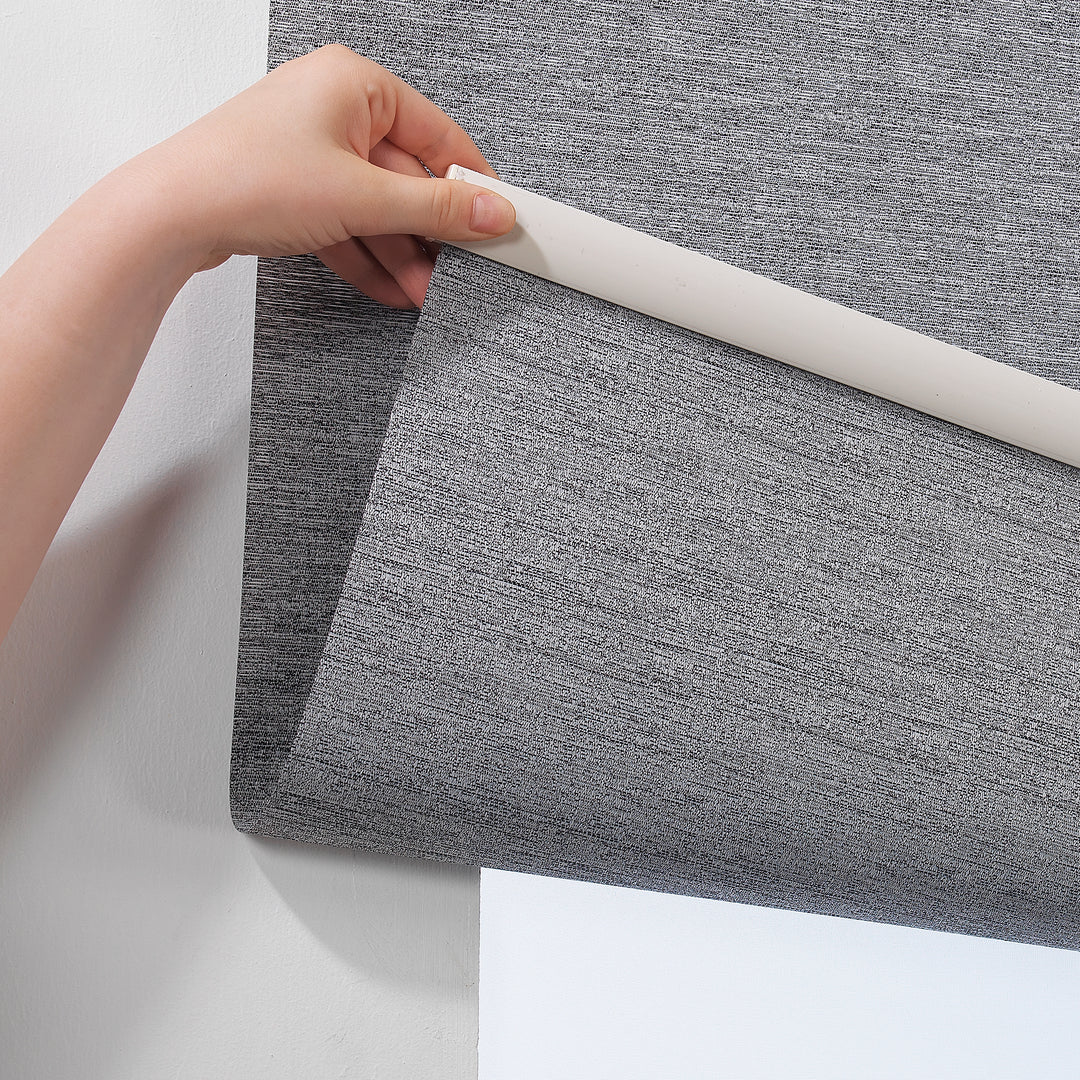 A grey marble‑textured room darkening roller blind made to measure, shown lowered with a soft stone‑effect surface and clean minimal edges