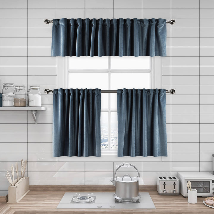 A made to measure kitchen valance in muted steel‑blue matte velvet, shown with a smooth plush texture and crisp structured edges for a refined modern appearance