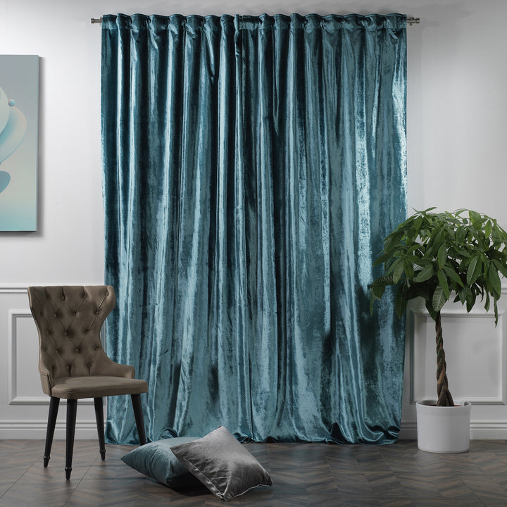 Shiny velvet curtain with adaptable top design suitable for both pole and track systems, featuring smooth full‑length fall.