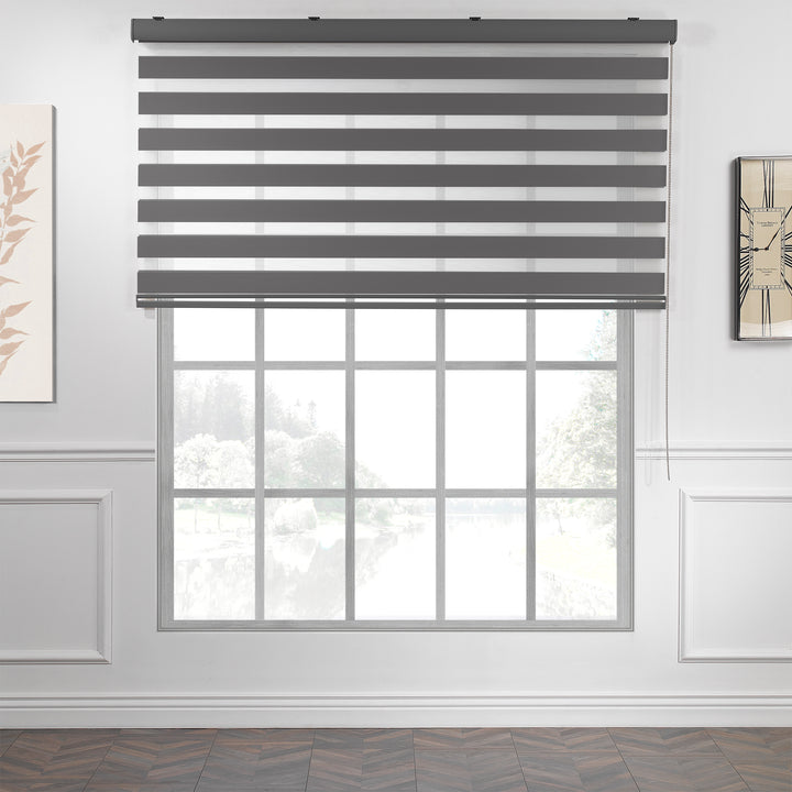 Made to measure anthracite zebra roller blind featuring deep smoky alternating sheer and dim‑out stripes for controlled light and enhanced privacy, highlighting its rich charcoal tone, smooth woven texture and sleek contemporary day‑and‑night blind design
