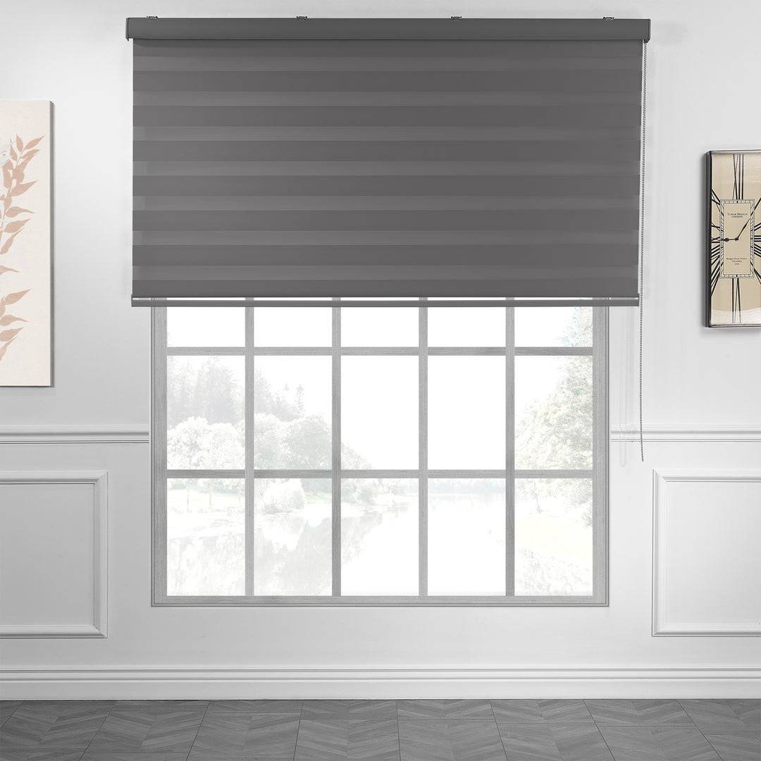 Made to measure anthracite zebra roller blind featuring deep smoky alternating sheer and dim‑out stripes for controlled light and enhanced privacy, highlighting its rich charcoal tone, smooth woven texture and sleek contemporary day‑and‑night blind design