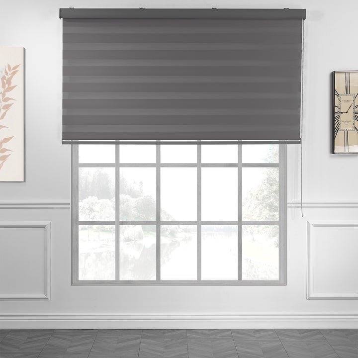 Made to measure anthracite zebra roller blind featuring deep smoky alternating sheer and dim‑out stripes for controlled light and enhanced privacy, highlighting its rich charcoal tone, smooth woven texture and sleek contemporary day‑and‑night blind design