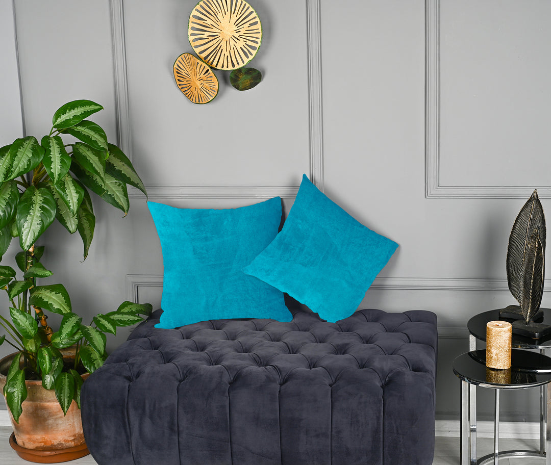 A made to measure cushion cover in soft aqua‑blue matte velvet, displaying a gentle velvety surface and neatly tailored edges for a fresh contemporary look