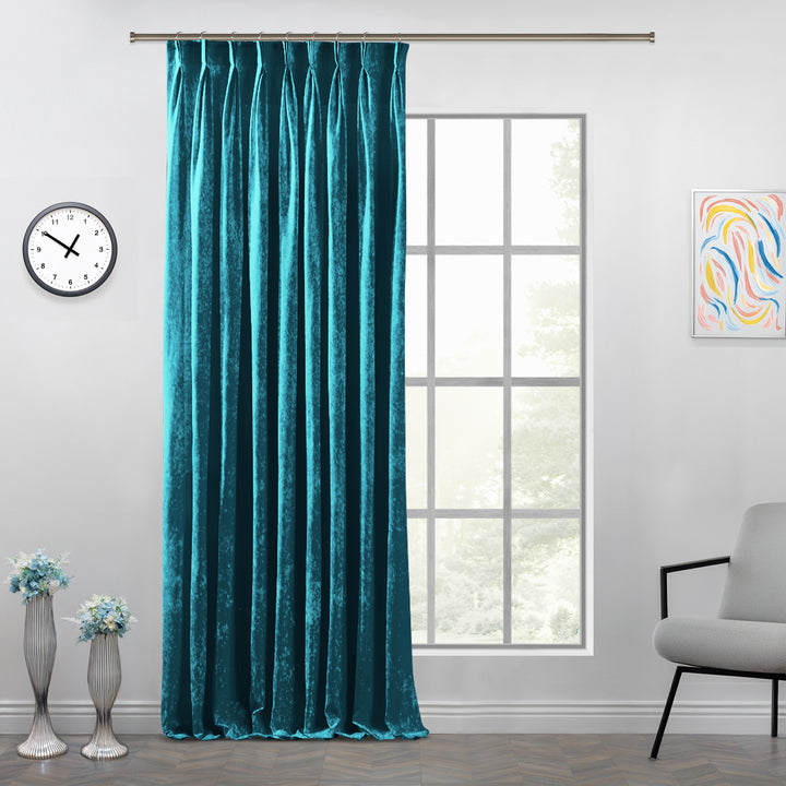 Luxury shiny velvet pinch pleat curtain with deep tailored folds and an extended graceful drop