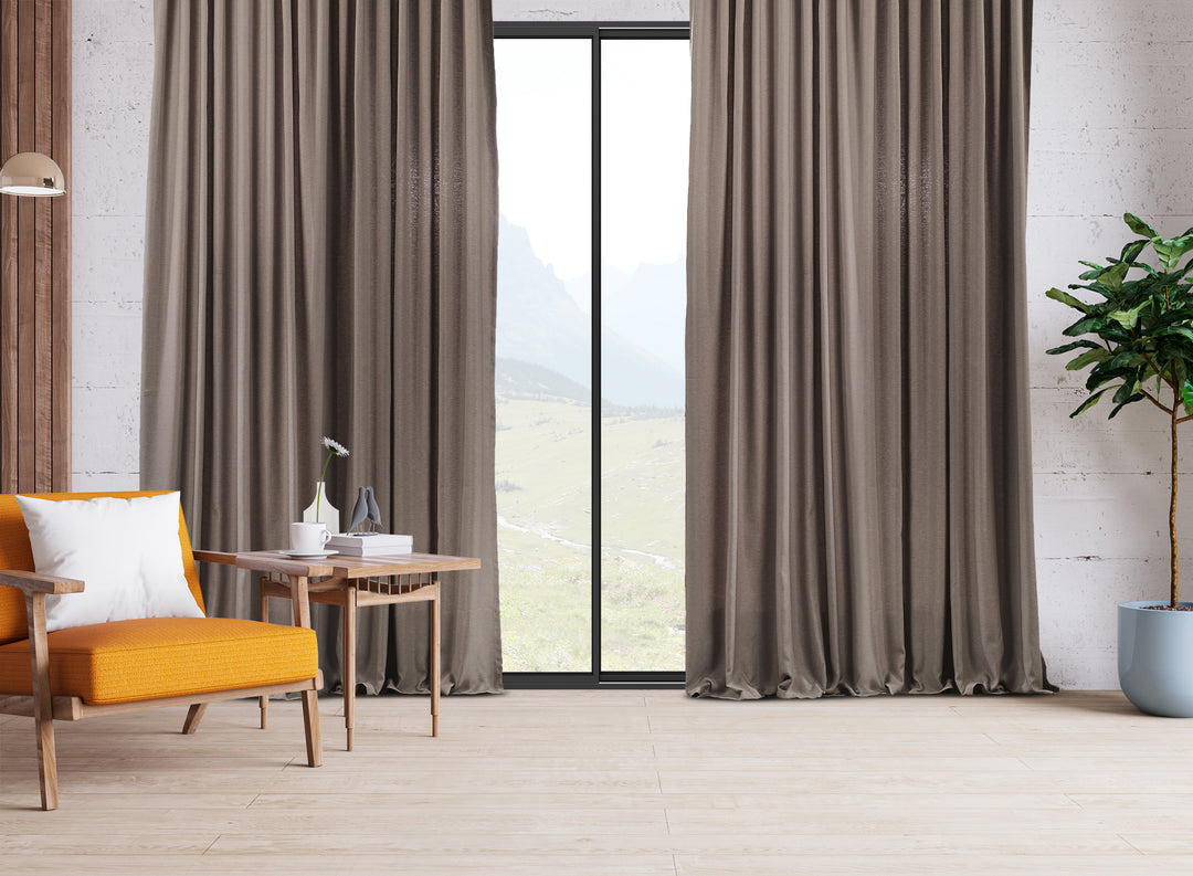  An extra‑long wide linen‑look door curtain in barley, showing smooth folds, airy daylight texture and a refined neutral finish