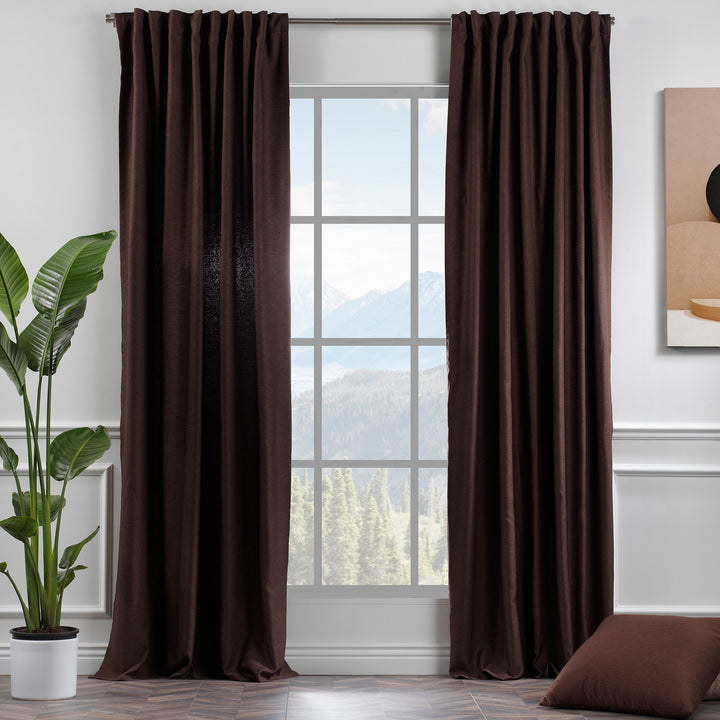 A made to measure linen‑look curtain in warm brown, displayed in daylight with textured weave and a soft structured drape