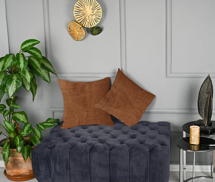 A made to measure cushion cover in deep caramel matte velvet, shown with a smooth plush texture and crisp tailored edges for a rich premium feel