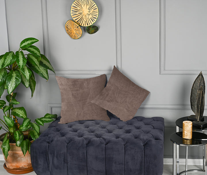 A made to measure cushion cover in warm taupe‑beige matte velvet, shown with a smooth velvety surface and clean structured edges for a premium feel