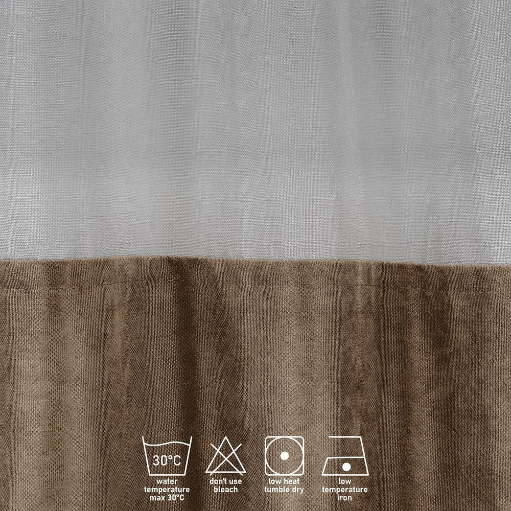A close‑up of a beige velvet and sheer block curtain, displaying smooth velvet texture and the airy sheer underlayer
