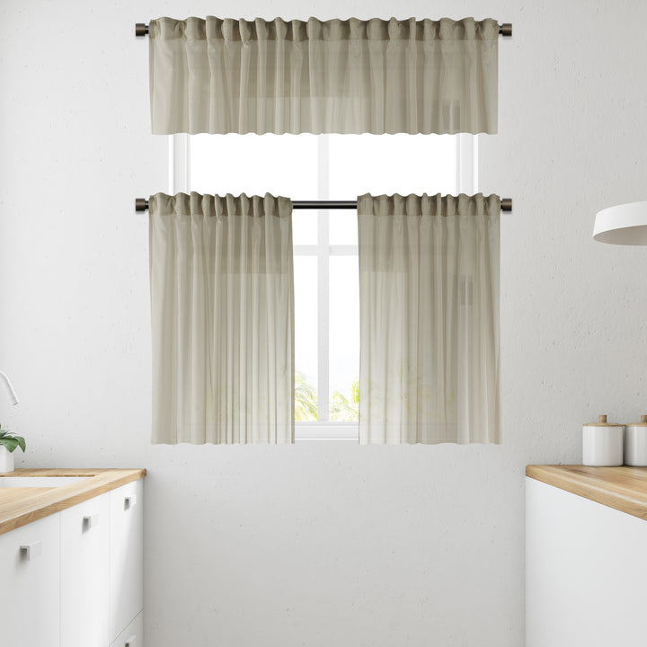 Beige sheer faux silk valance showing airy weave, smooth drape and natural light diffusion.