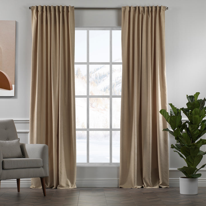 Soft beige velour curtains shown in daylight, highlighting smooth pile texture, gentle drape and premium made‑to‑measure finish.