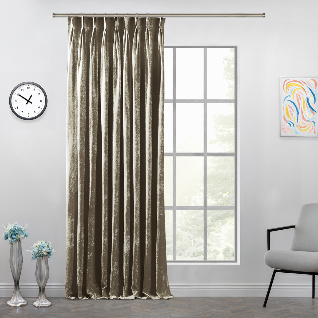 Beige shiny velvet pinch pleat curtain offering deep handcrafted folds and a smooth, elegant fall