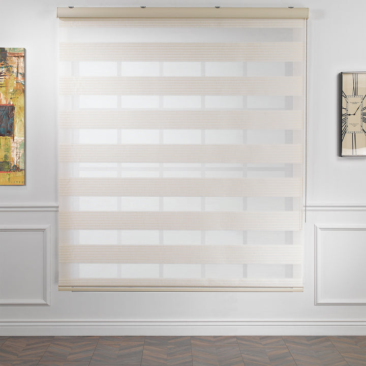 Made to measure beige thick pleated linen‑textured zebra roller blind featuring layered sheer and dim‑out stripes for warm natural light control and subtle privacy, highlighting its earthy beige tone, rich fabric texture and premium pleated day‑and‑night blind design