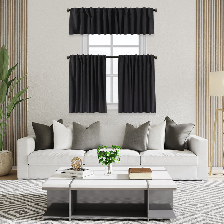 A made to measure kitchen valance in classic black velour, featuring a plush lightweight surface and clean structured edges for a bold refined appearance