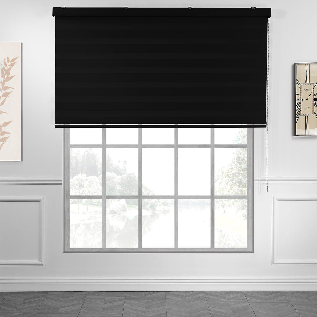 Made to measure solid black zebra roller blind featuring deep alternating sheer and dim‑out stripes that create a strong darkening effect and enhanced privacy, highlighting its bold black tone, smooth woven texture and modern day‑and‑night blind design.
