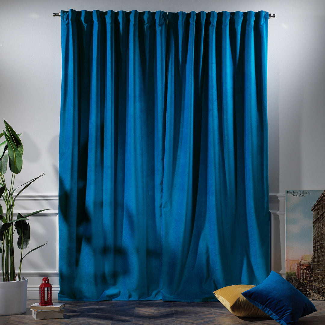 Made‑to‑measure matte velvet curtain hanging with a clean, contemporary drape and wide coverage.