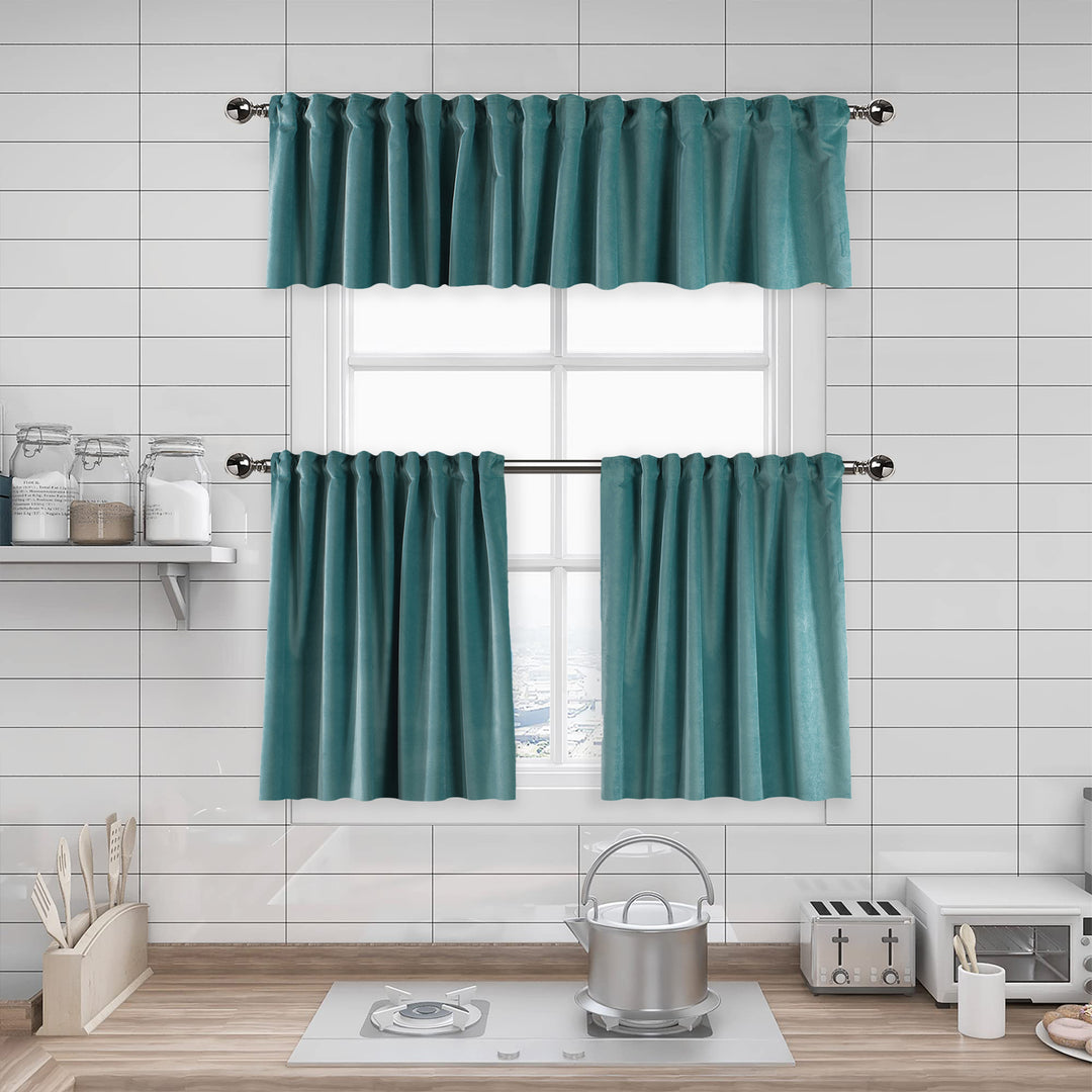 A made to measure kitchen valance in teal‑green matte velvet, shown with a smooth plush texture and neatly tailored edges for a rich modern finish