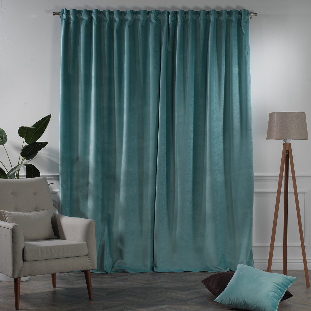 Tailored matte velvet curtain with generous fullness and a clean, modern drape.