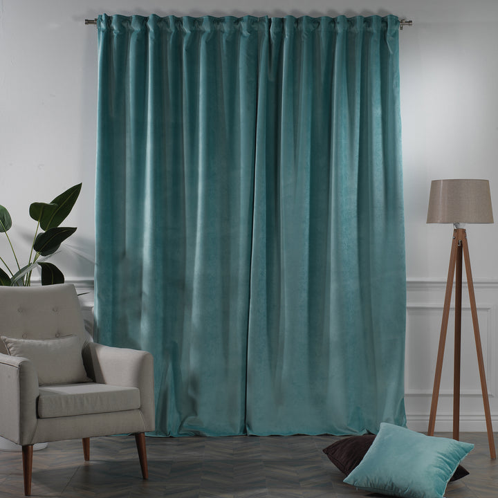 Tailored matte velvet curtain with generous fullness and a clean, modern drape.