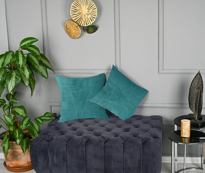 A made to measure cushion cover in teal‑green matte velvet, featuring a velvety surface and clean structured edges for a rich modern look