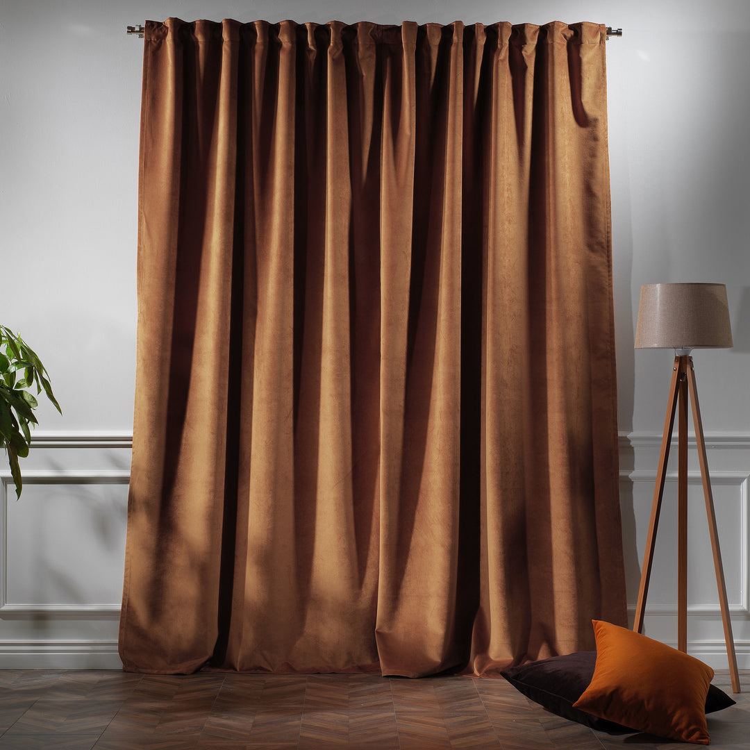 Amber velvet curtain panel offering full‑length drape and warm golden‑brown depth.