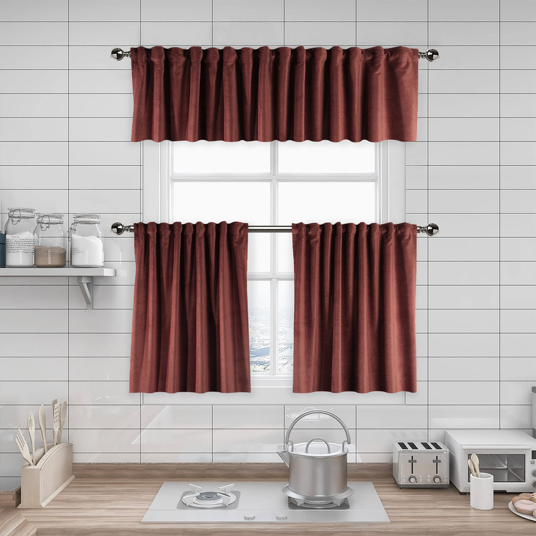 A made to measure kitchen valance in warm brick‑red matte velvet, shown with a plush smooth texture and neatly structured edges for a bold elegant finish