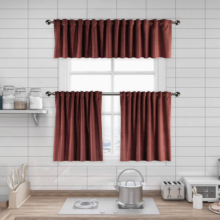 A made to measure kitchen valance in warm brick‑red matte velvet, shown with a plush smooth texture and neatly structured edges for a bold elegant finish