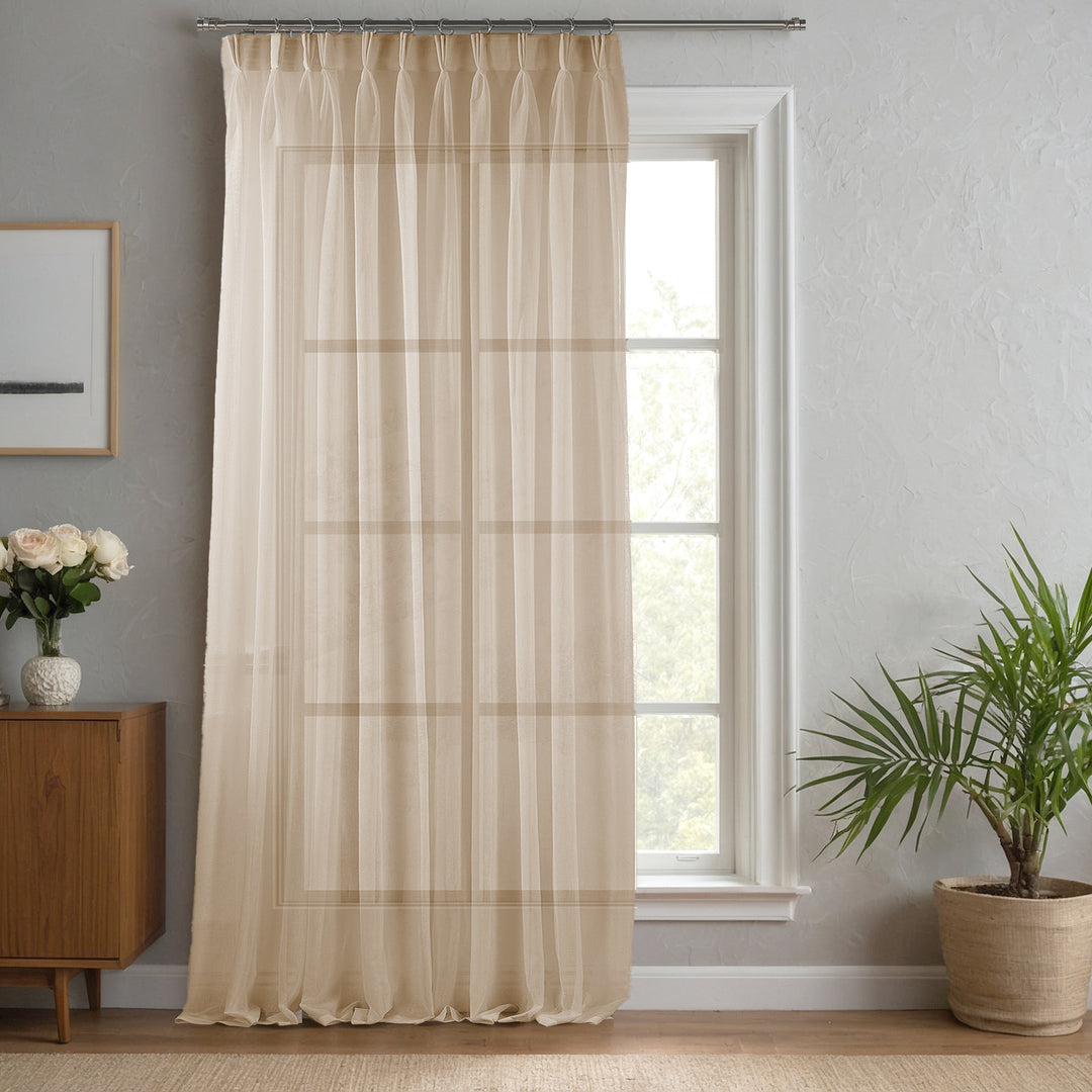 Brown linen‑sheer curtain made to measure with structured pinch pleats and warm earthy tone for modern interiors.