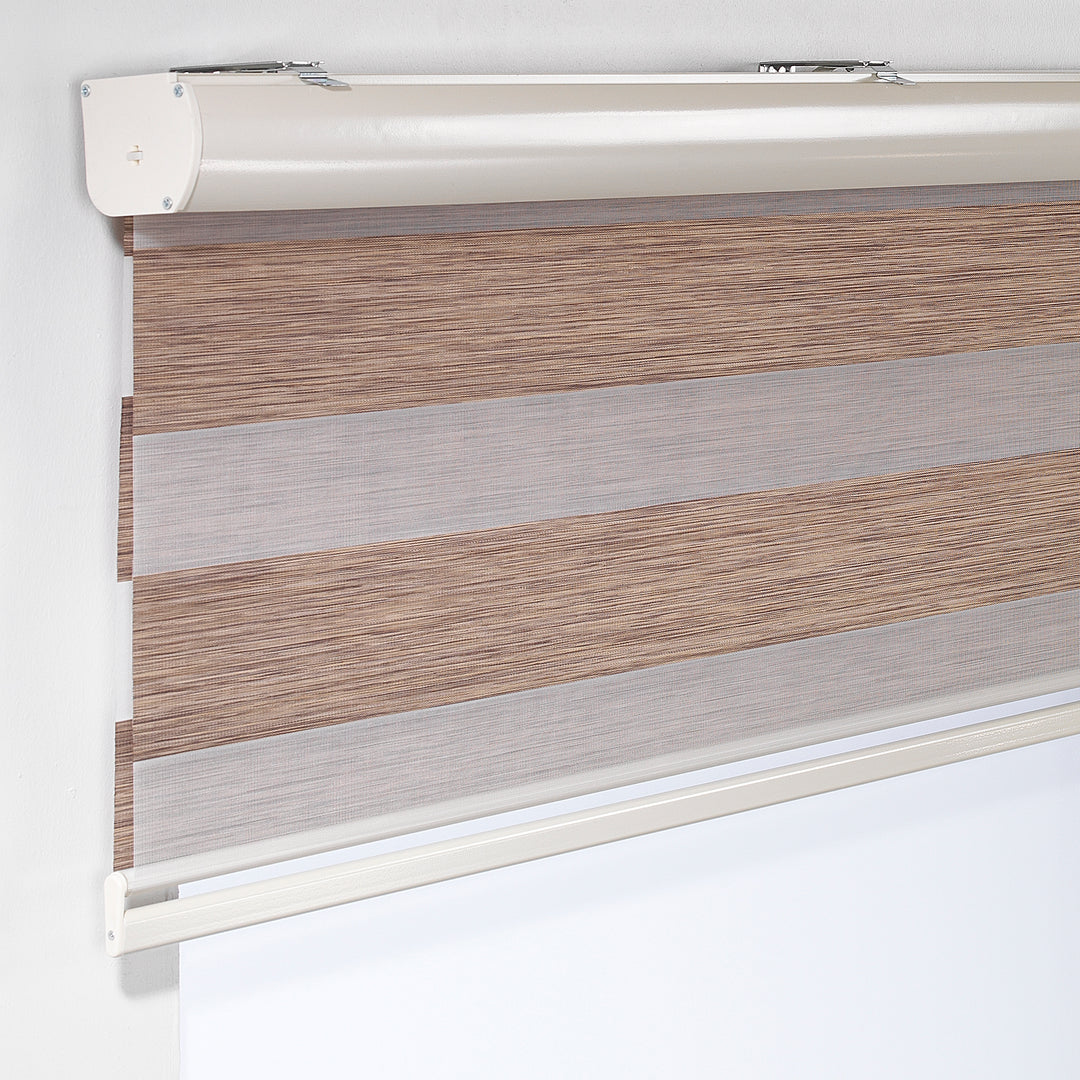 Made to measure zebra roller blind in brown, designed with alternating sheer and opaque horizontal stripes to provide flexible light control and privacy, highlighting the warm brown tone, refined texture and modern day‑and‑night blind style.